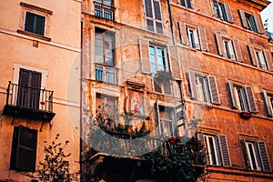 Madonna painting on apartment building  in Rome, Italy photo